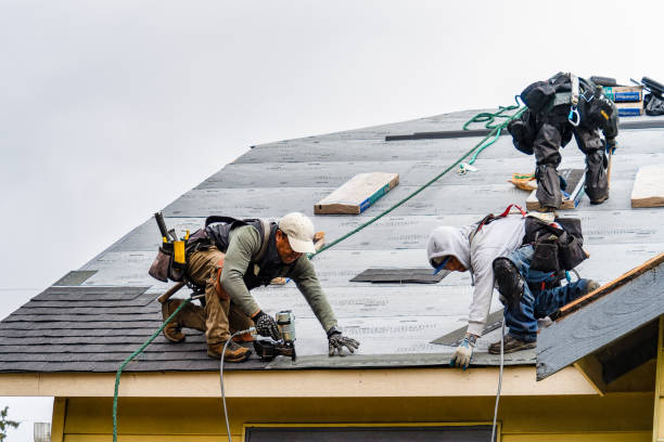 Professional Gutter Installation technician working in Sycamore, PA